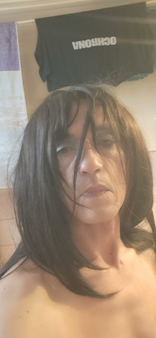 My first makeup and long hair. Sexy lingerie I ride a big dildo. Who likes me in makeup and hair like that?
