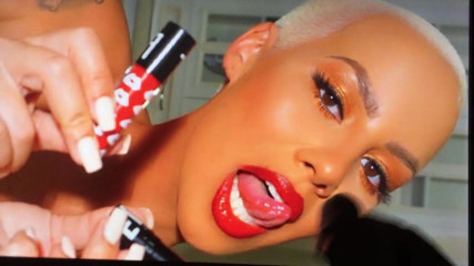AMBER ROSE GETS SPLATTERED