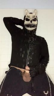 demon soaking himself in a fountain of piss