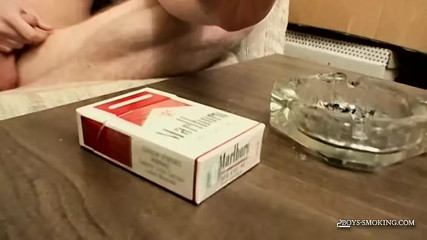 Gay teen Wets His Cigar With The Tip Of His Dick