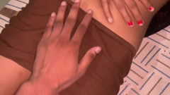 Lying on the cot, fingered the pussy.