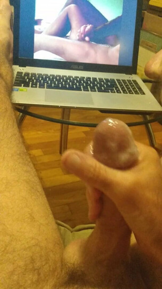 Jerking Off To Porno of Guy Getting Jerked Off