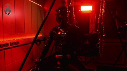 Rubberdrone jerk off in red light