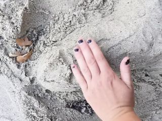 Penis sex art on a summer beach