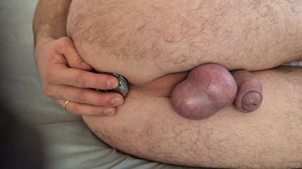 Cock and Ball banding with anal plug and cumshot