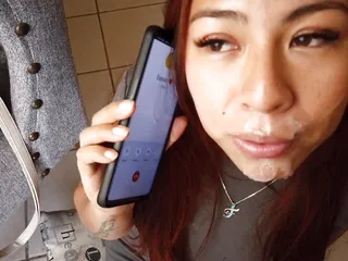 She sucks me off while talking to her husband on the phone