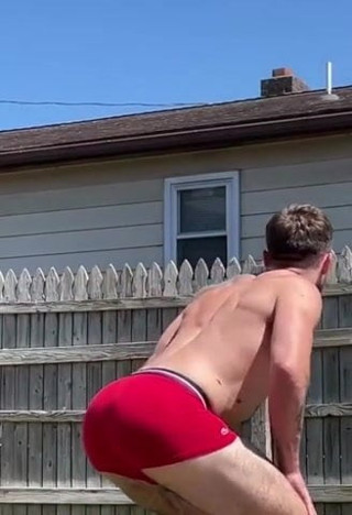 Muscle bearded guy in shorts big bulge