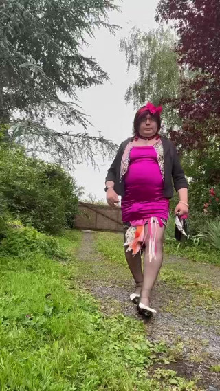 Dressed in a little fuchsia dress for an evening