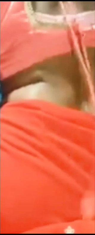 Getting naked. Partially unscrewing the bra.