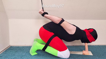Soccer Player sucking Dildo in predicament Bondage.