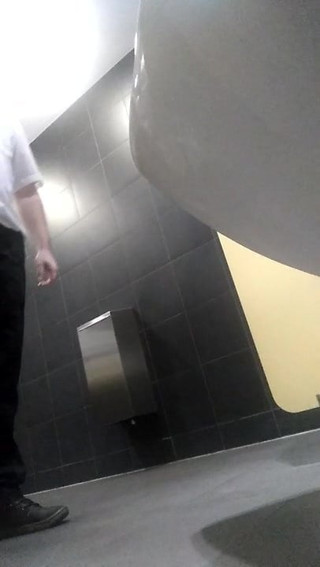 Jerking in public toilet