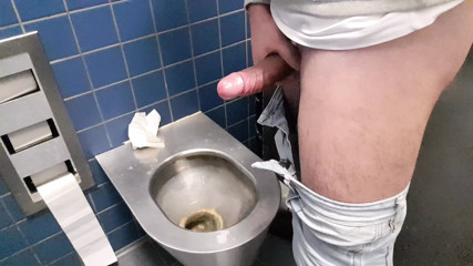 Big fat cock with ring jerk off in public toilete in Germany.