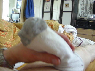 I squirt into my worn sock