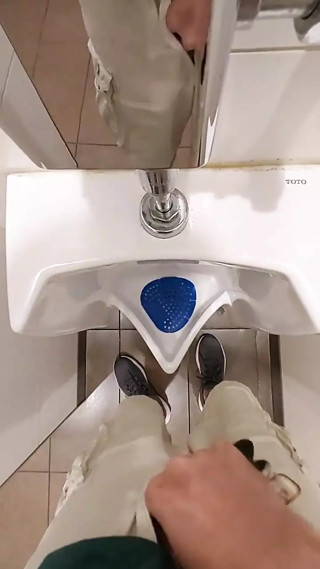 Taking a Piss at a Urinal