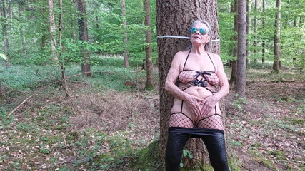 Granny Is Masturbating in the Woods!