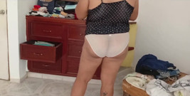 Chubby Girl Tidying the Room and Folding Clothes