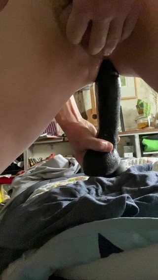 Taking that big dildo deep