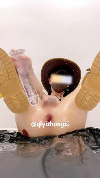 Cowboy boy plays with big cock toy and squirts in asshole