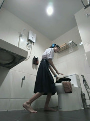 Change into a school uniform in the restroom