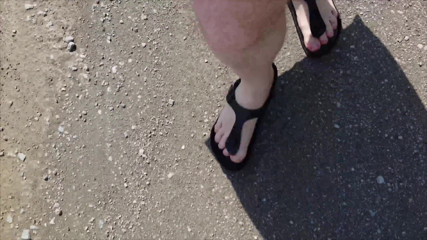 Outdoor in a Black Caftan and Barefoot in Black Birkenstocks