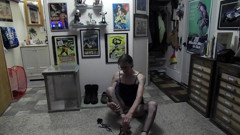 foot covers, fishnet stockings and satin camisole