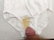 Rubbing myself on cute white panties then peeing on them a little