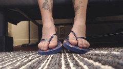 Navy toe play in flip flops