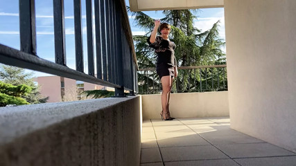 On the terrace mini skirt and fishnet stockings