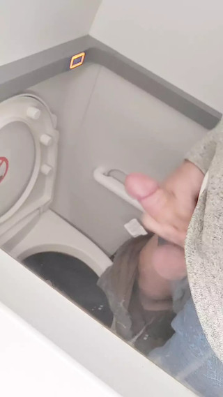 Enjoying a Wank on the Airplane