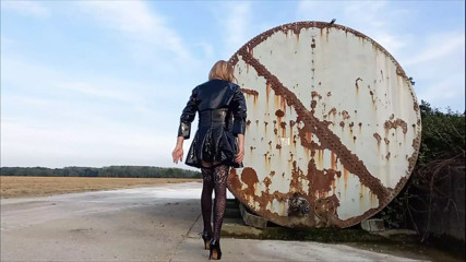 Crossdresser Playing Down on the Farm in PVC
