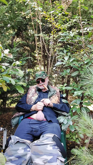 Officer assigned to stake out duty in camouflage