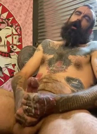 TATOO STUD SHOOTING HIS LOAD 1