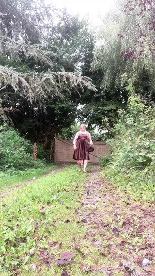 Dressed with a brown evening dress for a night out