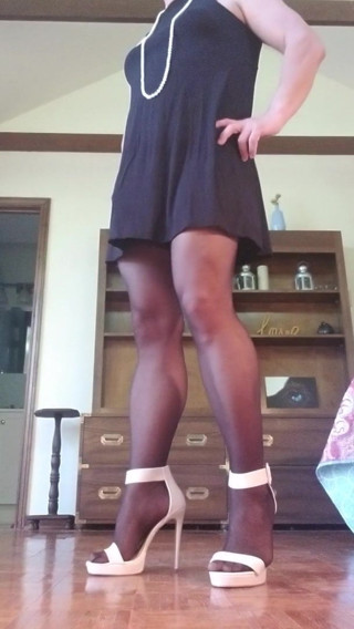 Sexy Crossdresser in Black Dress and White Heels