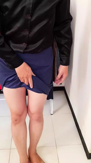 Crossdressing wearing secretary satin blouse and formal office skirt