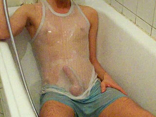 Shower with Clothes and hard Cock