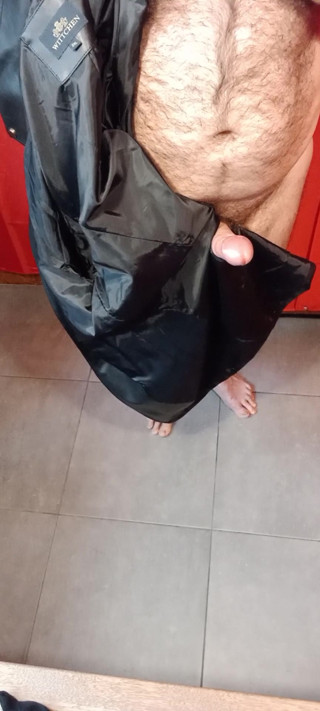 Ejaculating on the lining of her black leather coat