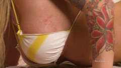 Brooke Banner throws her head back and catches cum with her tits