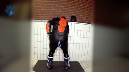 RubberBikerPup with new FOX Comp R boots and protective gear