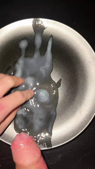 Huge cumshot on a plate with some cumplay
