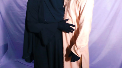 Bangladeshi beautiful hijabi woman enjoying with her neighbor in her bedroom