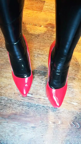 Alice Latexy models in stilettos and black and red latex (aka Latexdesires) thumbnail