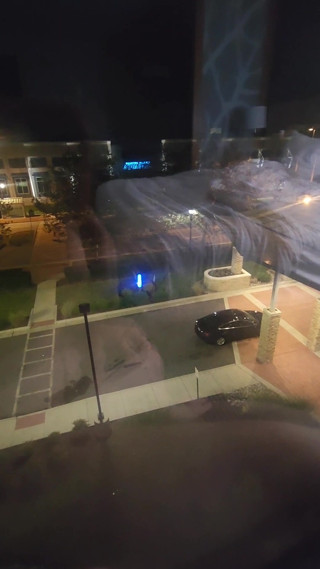 Jerkin While Nude in the Hotel Window