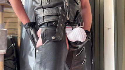 Different view, showing off my arse and bulge in leather chaps boots and bulging jockstrap and leather gloves