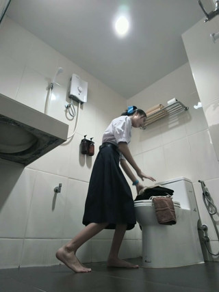 Change into a school uniform in the restroom