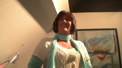Sexy MILF moans as she fucks her shaved pussy with a dildo