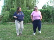 Large ladies finger each other's pussies