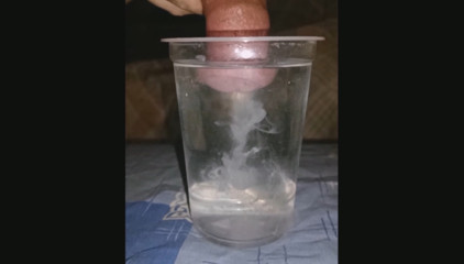 I release white swirling clouds of thick semen into the water in slow motion