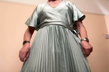 Enjoying wearing my pleated dress.