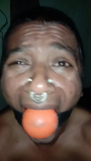 Ball gagged slave in pain